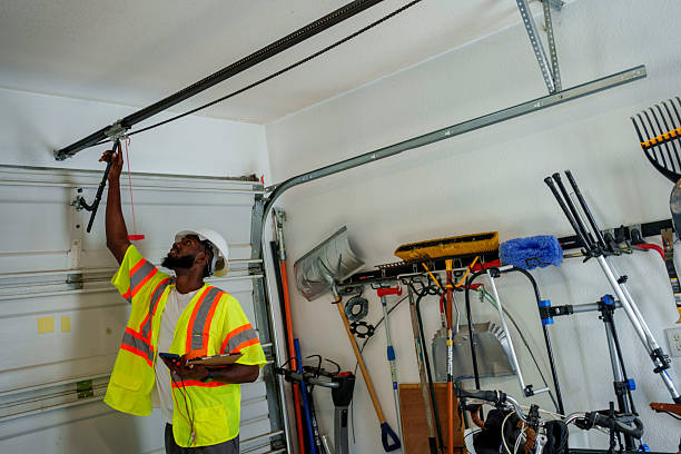 Professional Garage Door Panel Replacement technician working in Lake City, IA